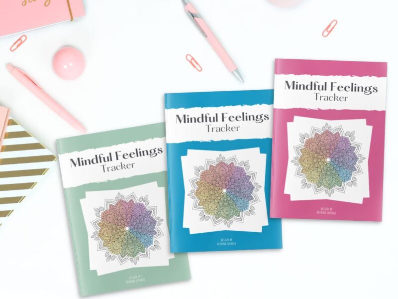 Covers of Mindful Feelings Tracker shown in green, blue, and pink options