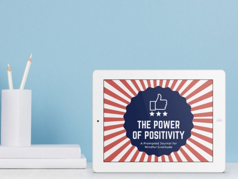 The Power of Positivity gratitude journal cover displayed on a tablet